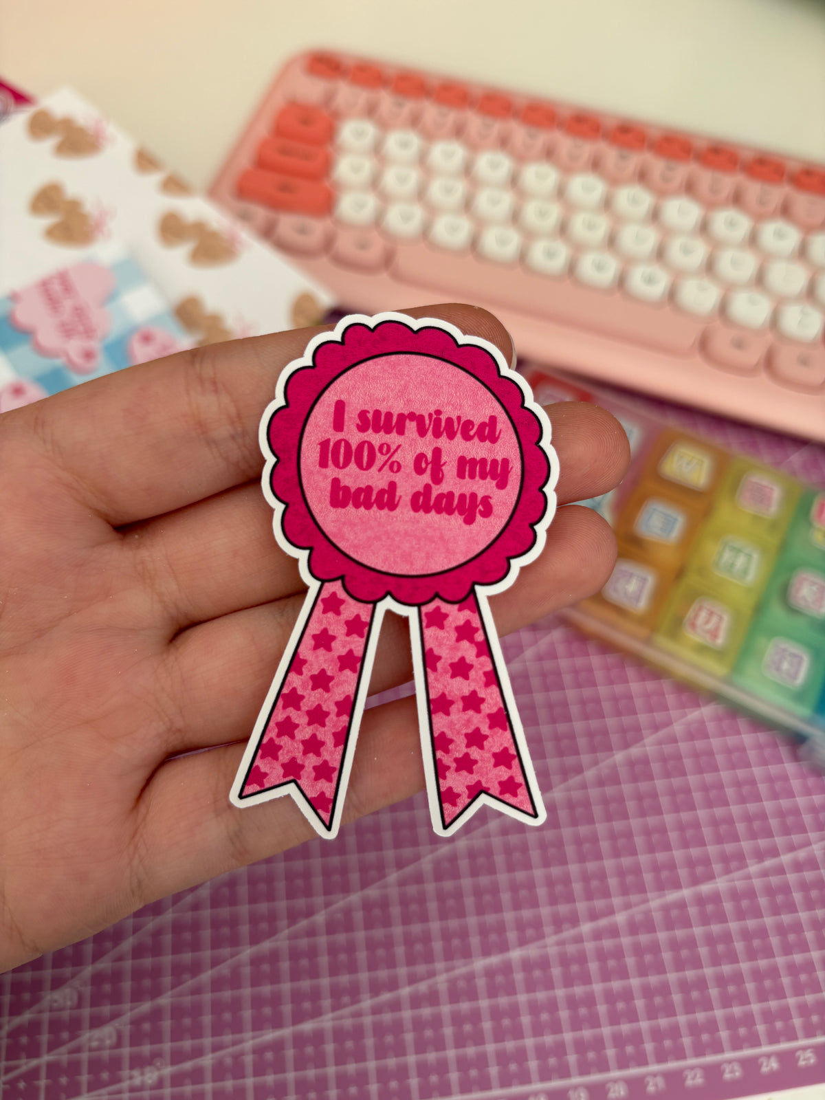 100% pink rosette vinyl sticker